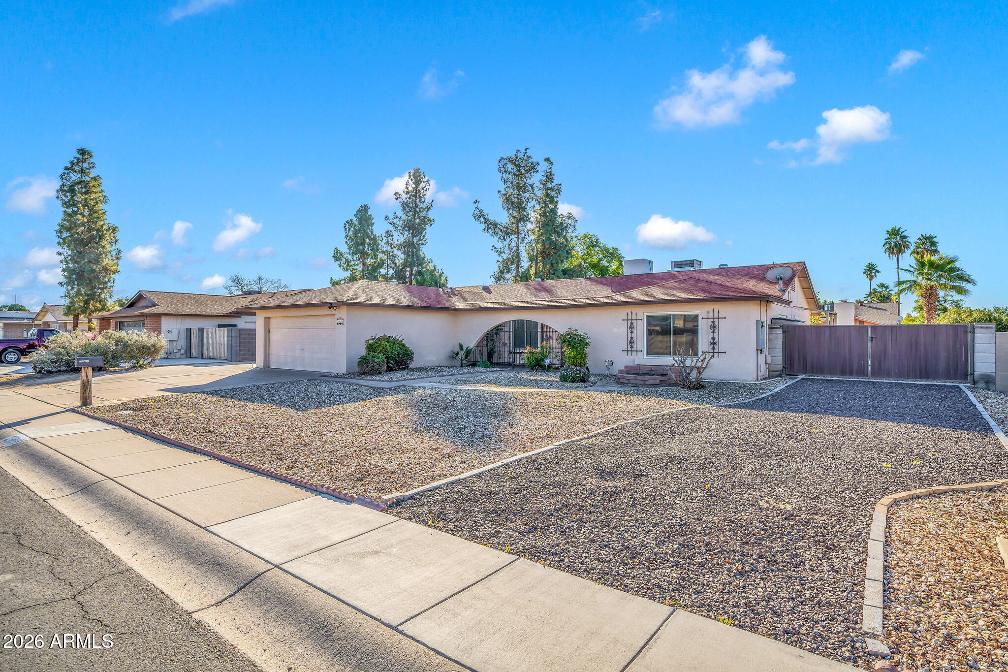 3033 West Kathleen Road Phoenix, AZ 85053 - Photo 2 of 42 a view of house with outdoor space and sitting area