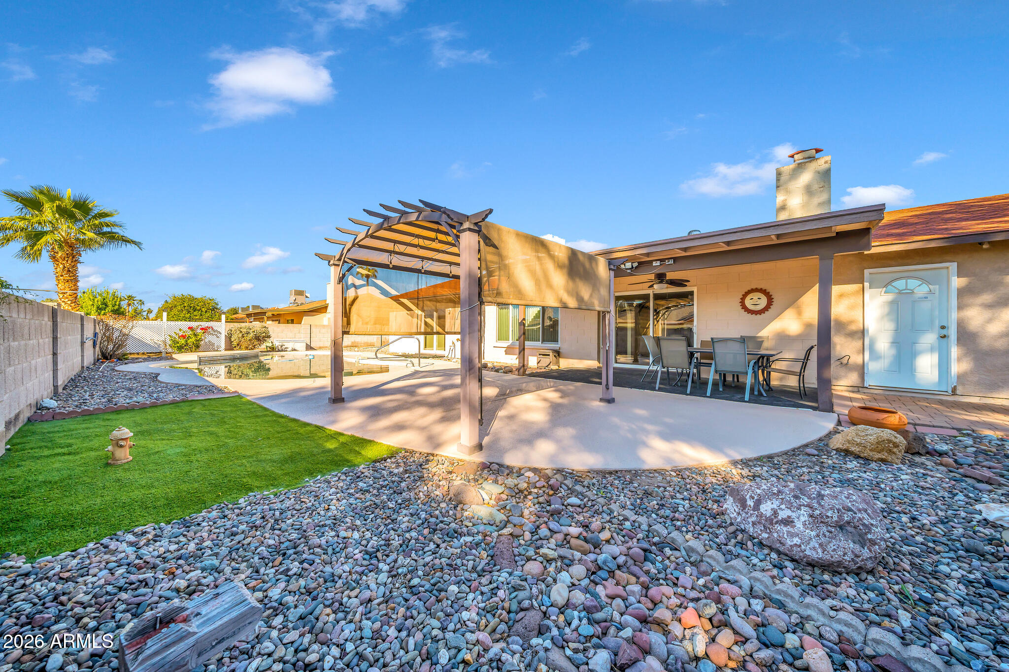 3033 West Kathleen Road Phoenix, AZ 85053 - Photo 30 of 42 a view of a backyard with swimming pool