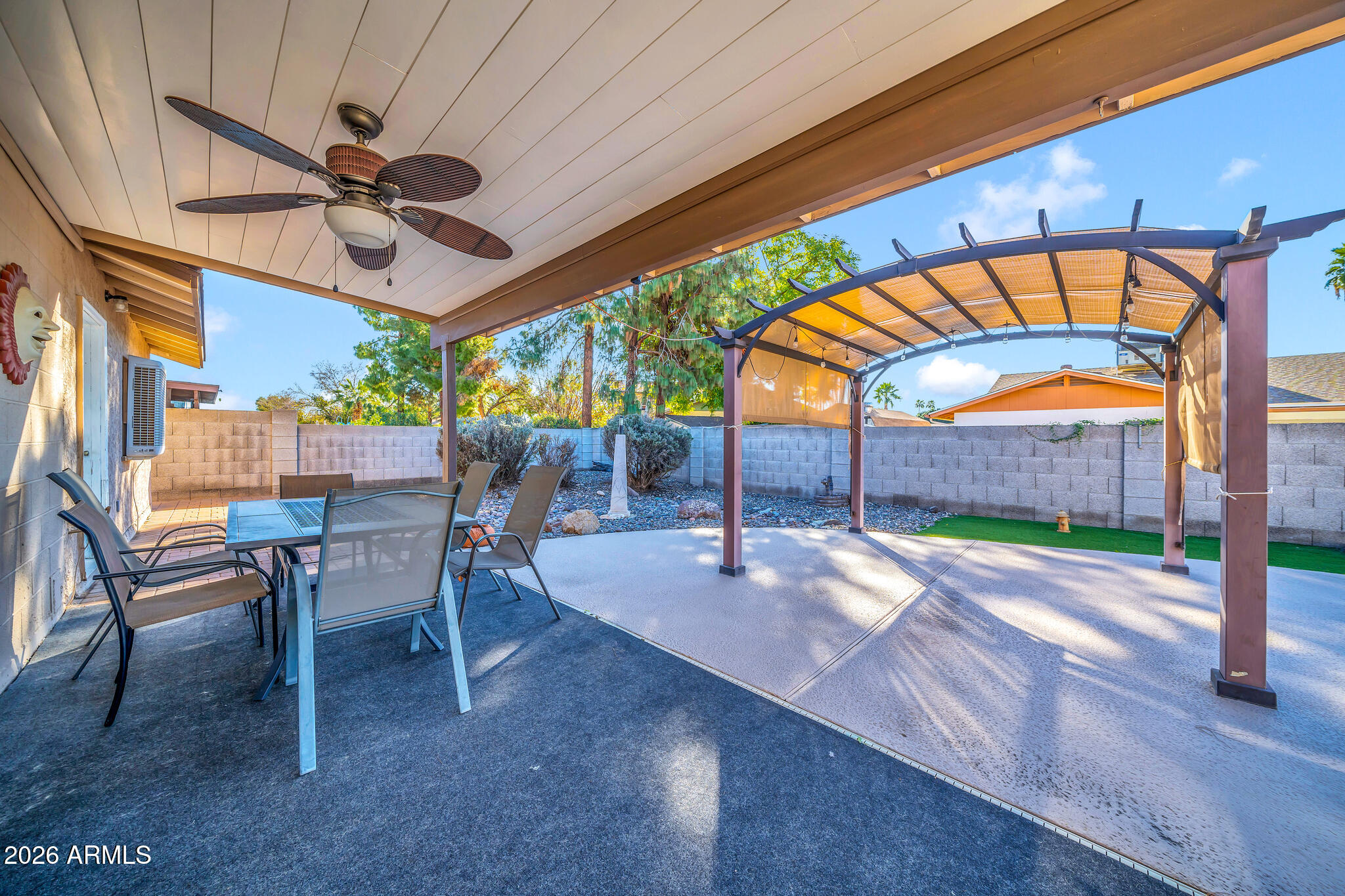 3033 West Kathleen Road Phoenix, AZ 85053 - Photo 35 of 42 a patio with a table and chairs