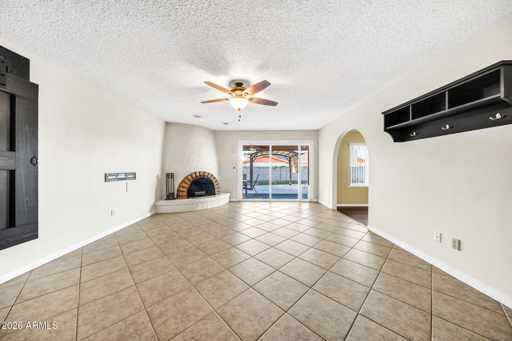3033 West Kathleen Road Phoenix, AZ 85053 - Photo 6 of 42 a view of livingroom with furniture and window