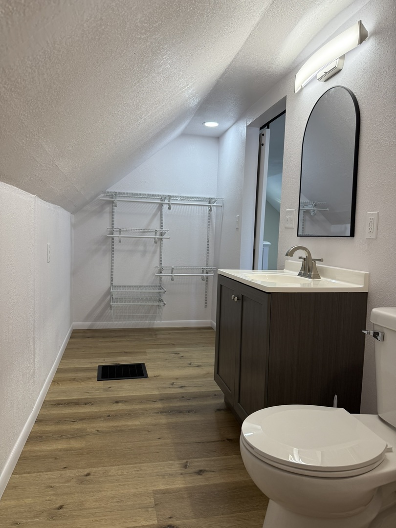 418 East Chestnut Street Paxton, IL 60957 - Photo 14 of 16 a bathroom with a sink and a mirror