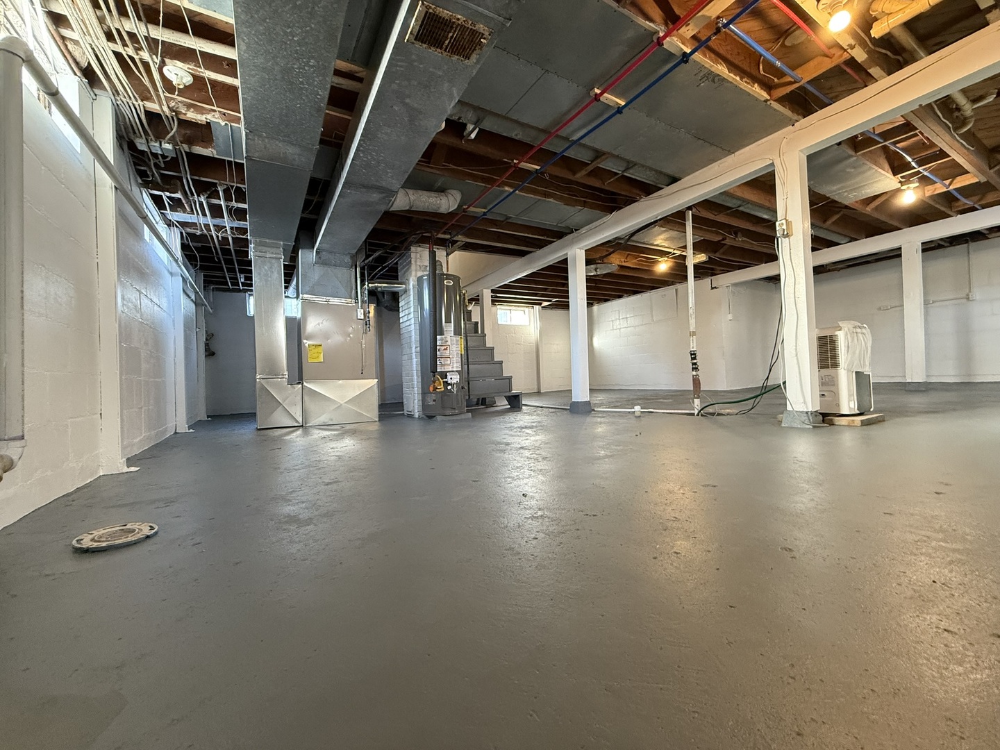 418 East Chestnut Street Paxton, IL 60957 - Photo 15 of 16 a view of an empty room with stairs