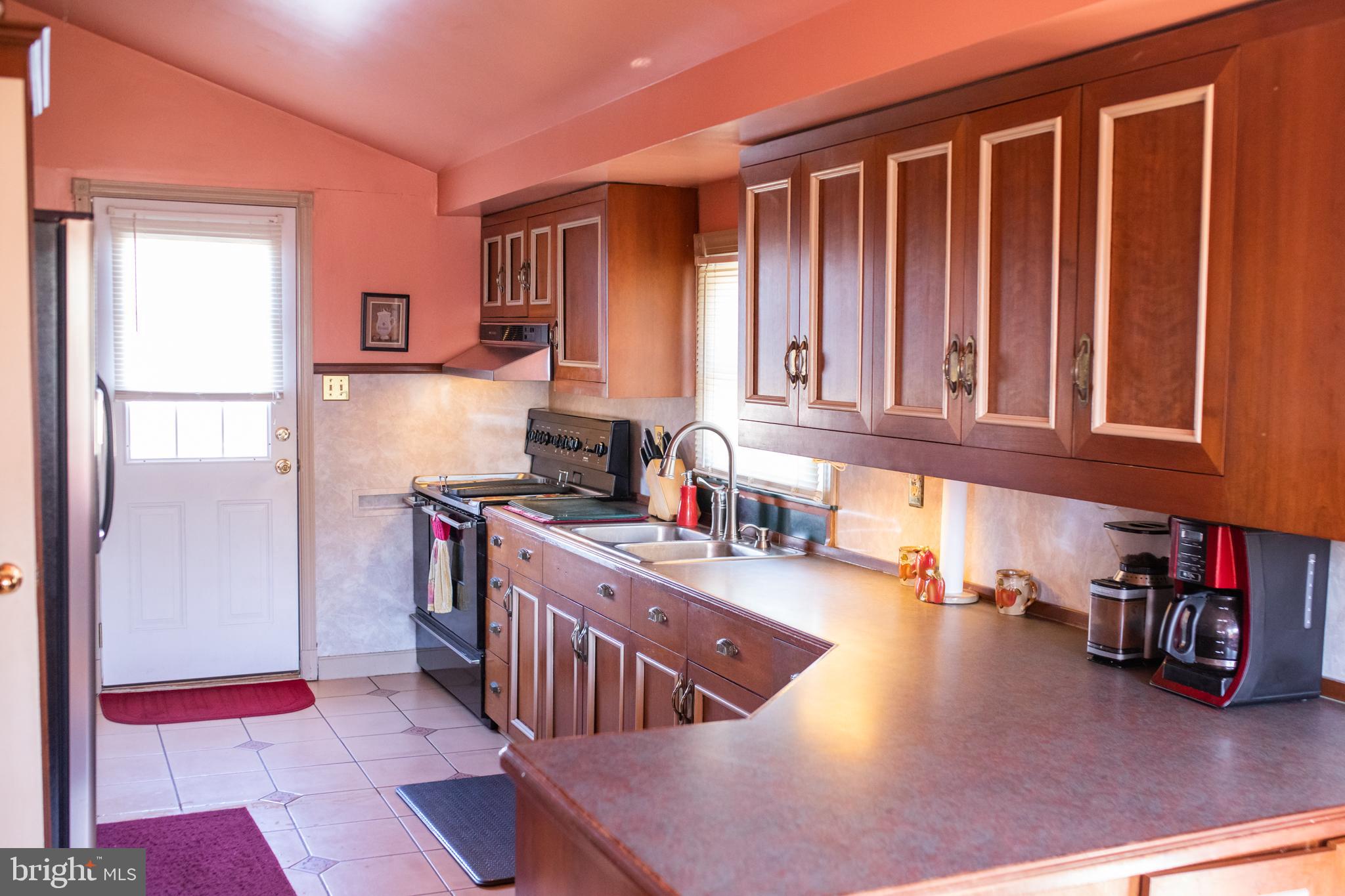 144 Friendship Road Friendship, MD 20758 - Photo 5 of 21 Kitchen with Custom Cabinets