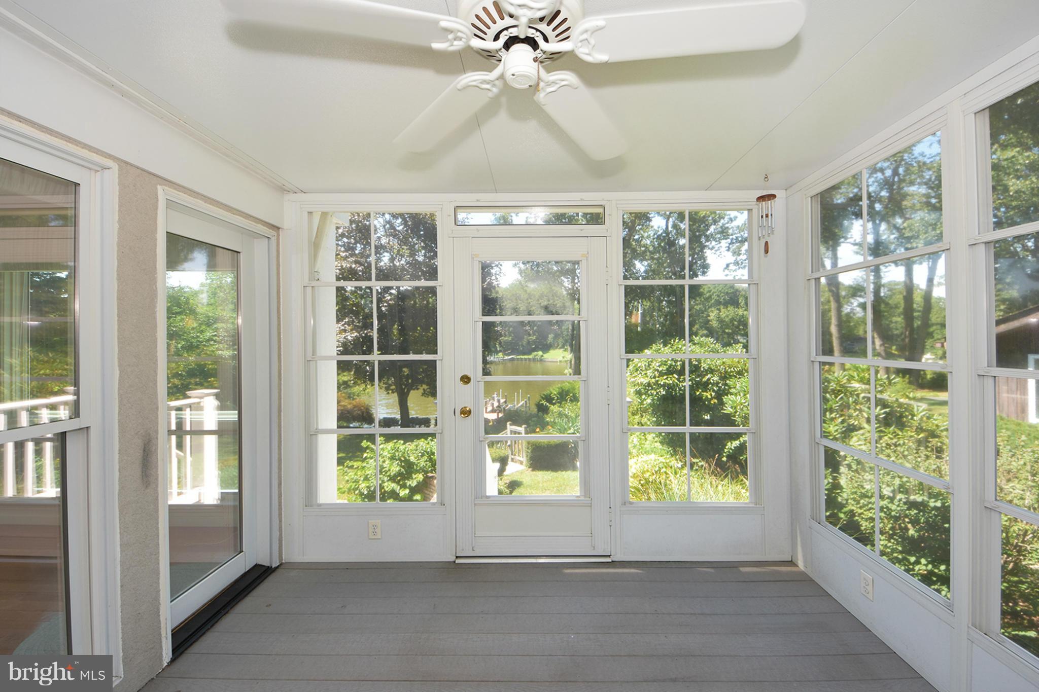 1866 Burley Road Annapolis, MD 21409 - Photo 14 of 26 Waterside porch with wall of windows