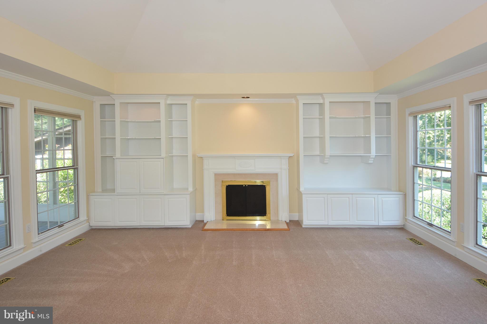 1866 Burley Road Annapolis, MD 21409 - Photo 7 of 26 Fireplace and vaulted ceiling in the living room