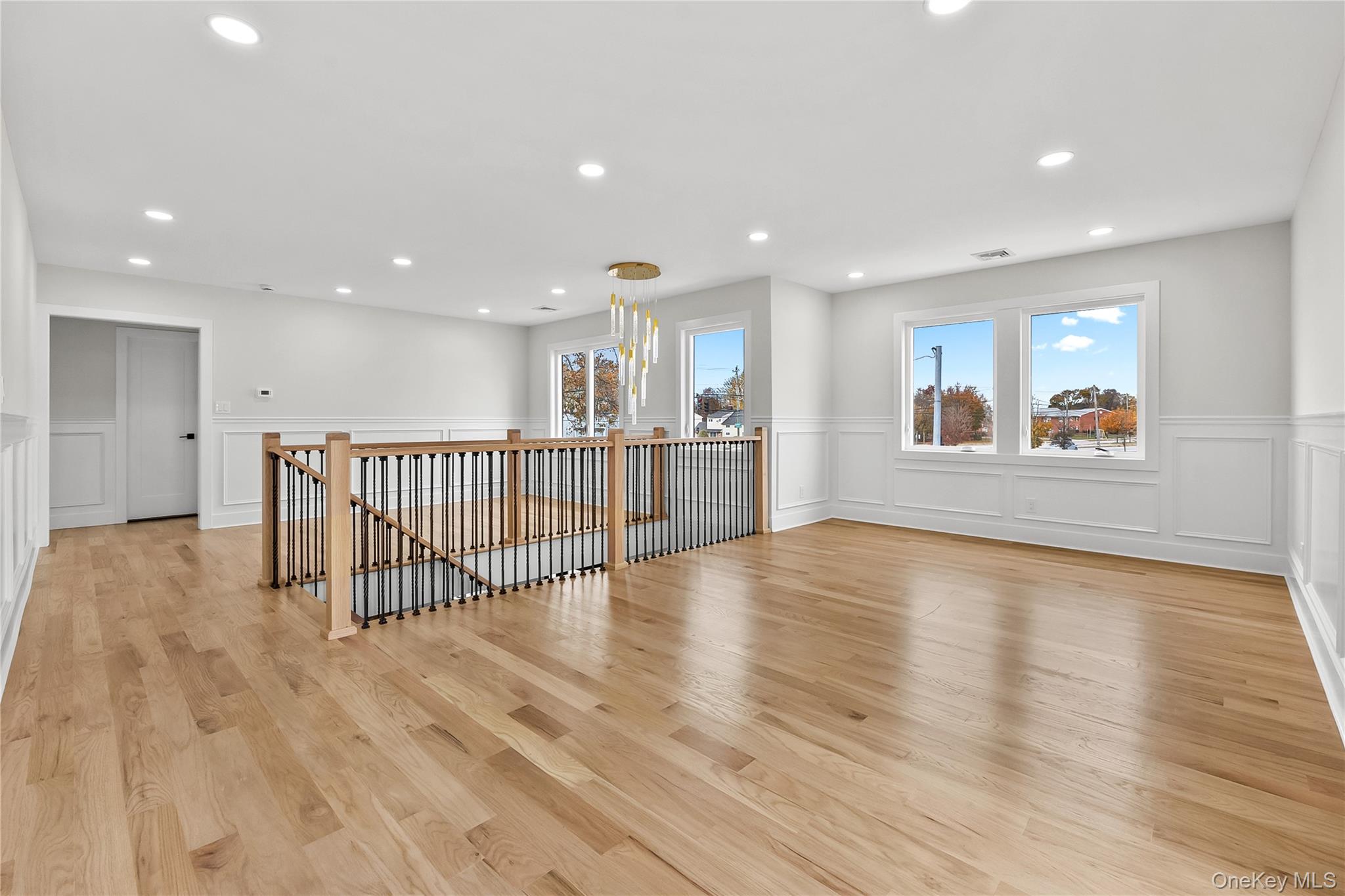 2 Orchid Road Levittown, NY 11756 - Photo 23 of 46 a view of a kitchen with a sink and an oven