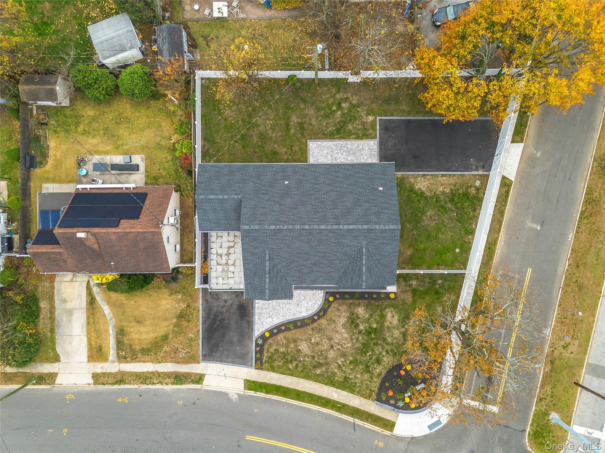 2 Orchid Road Levittown, NY 11756 - Photo 43 of 46 aerial view of a house with a swimming pool