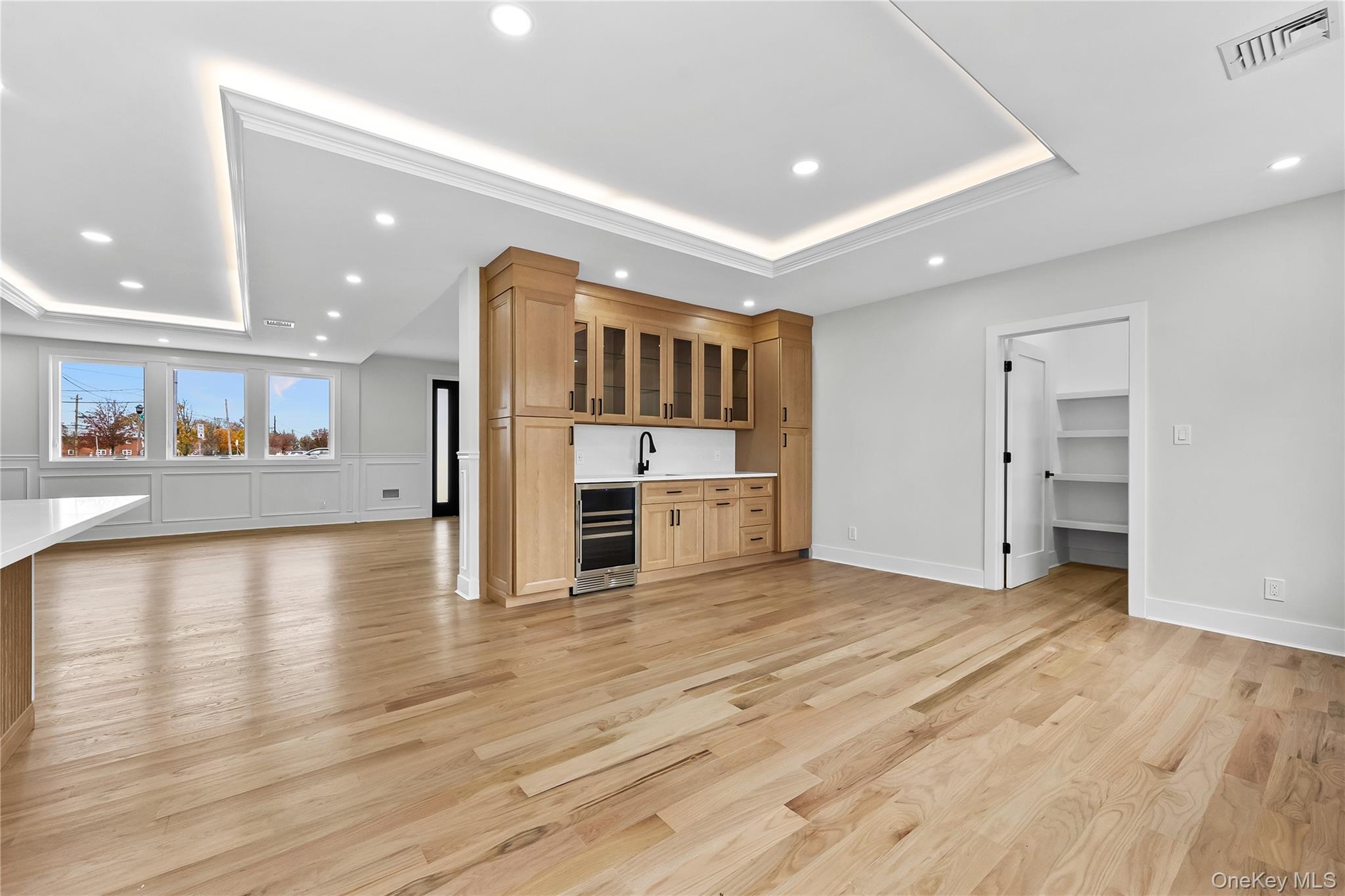 2 Orchid Road Levittown, NY 11756 - Photo 10 of 46 a view of a kitchen with stainless steel appliances a refrigerator and a stove top oven