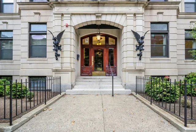a view of entrance gate of a house