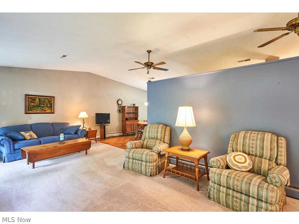 855 Old Spring Road Akron, OH 44321 - Photo 3 of 30 The living room and dining room has vaulted ceilings