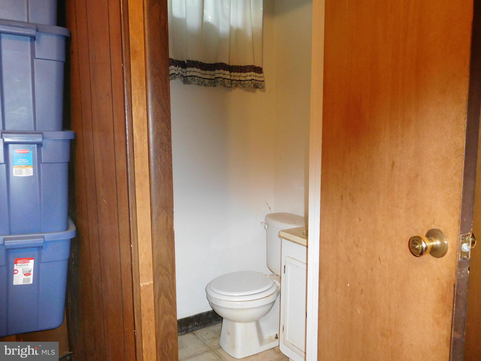 732 Mansfield Road Essex, MD 21221 - Photo 16 of 26 lower level half bath