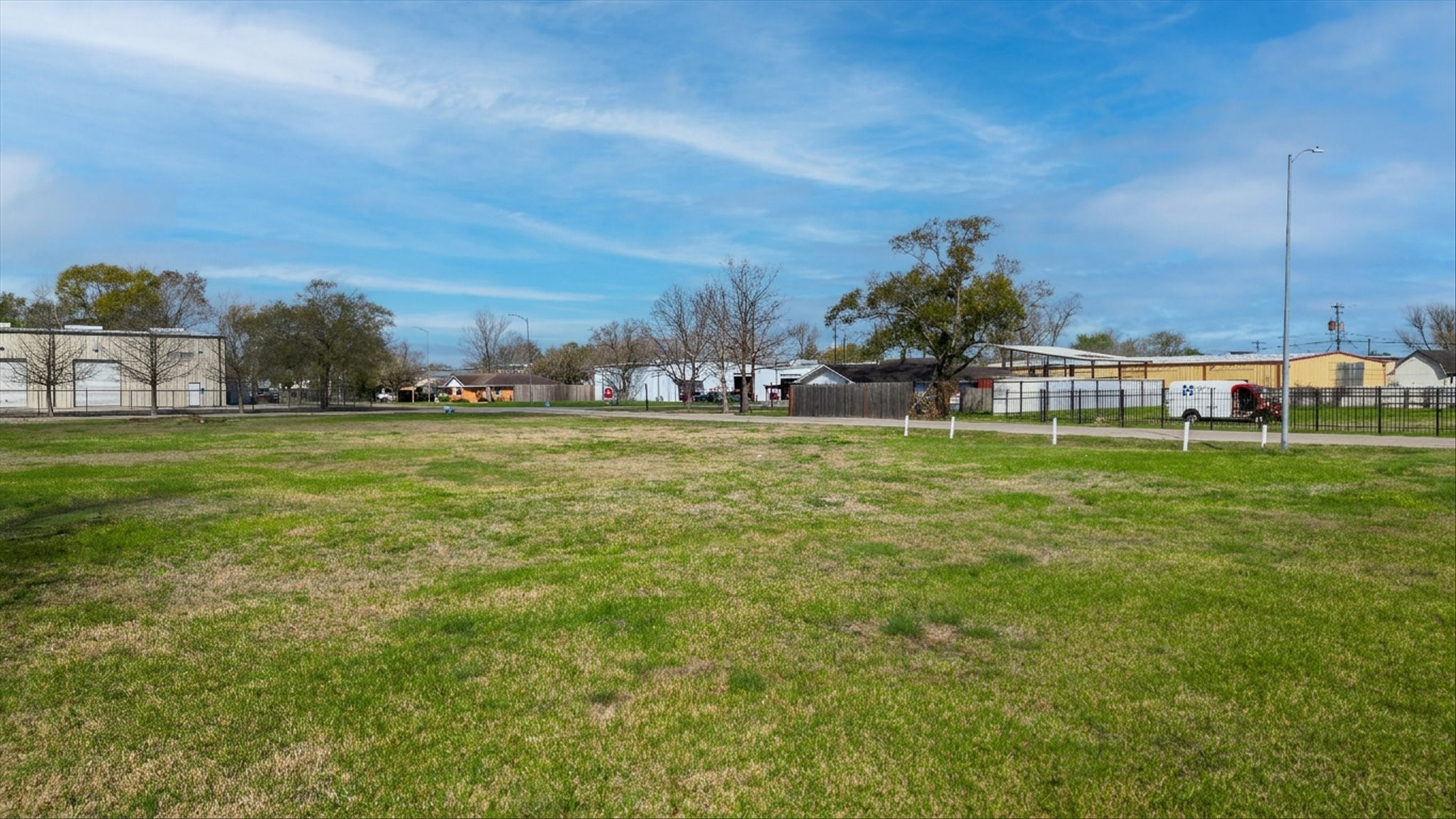 5909 Cypress Street Houston, TX 77074 - Photo 13 of 14 a view of a field with lawn chairs