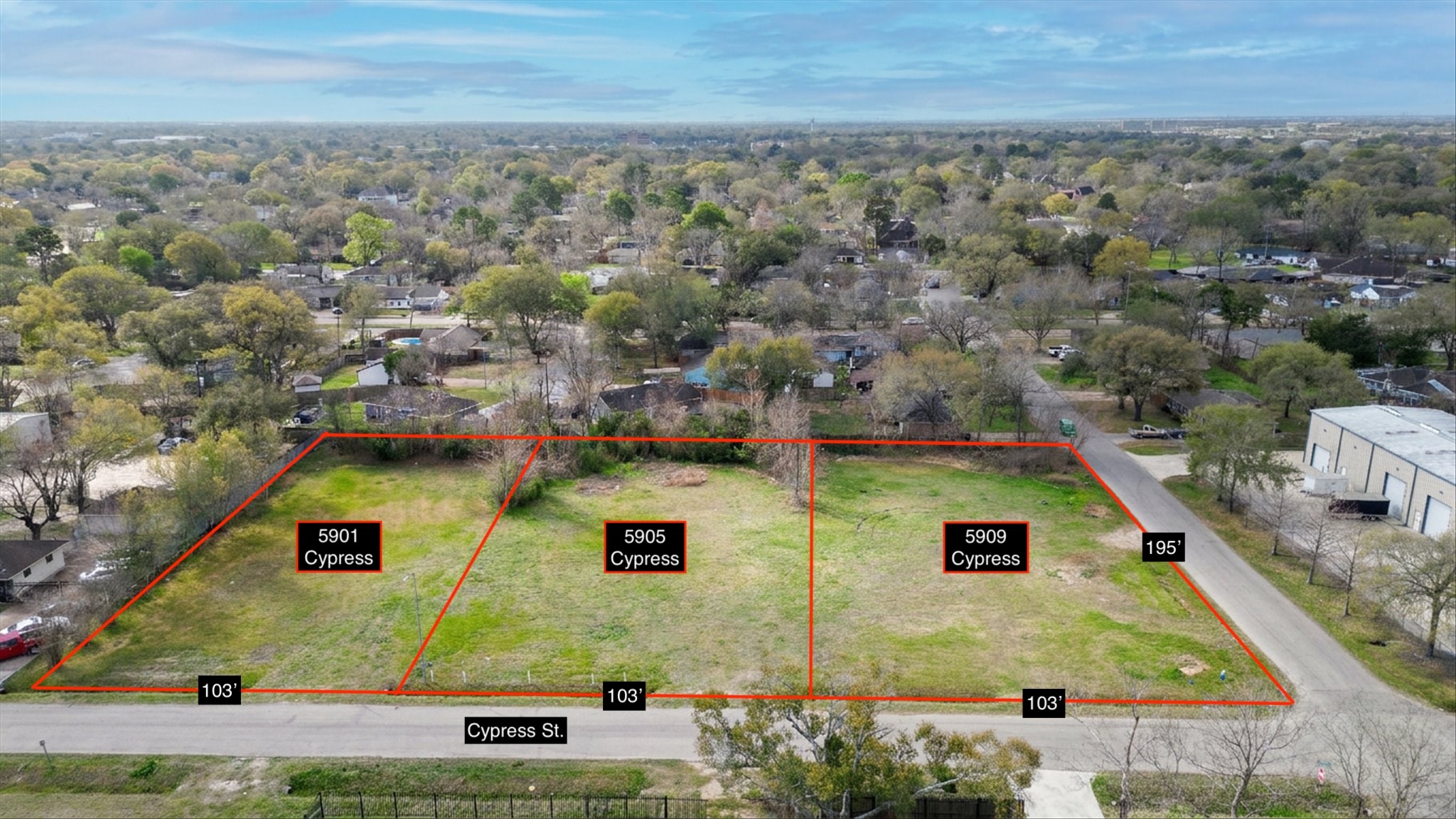 5909 Cypress Street Houston, TX 77074 - Photo 2 of 14 an aerial view of residential houses with outdoor space