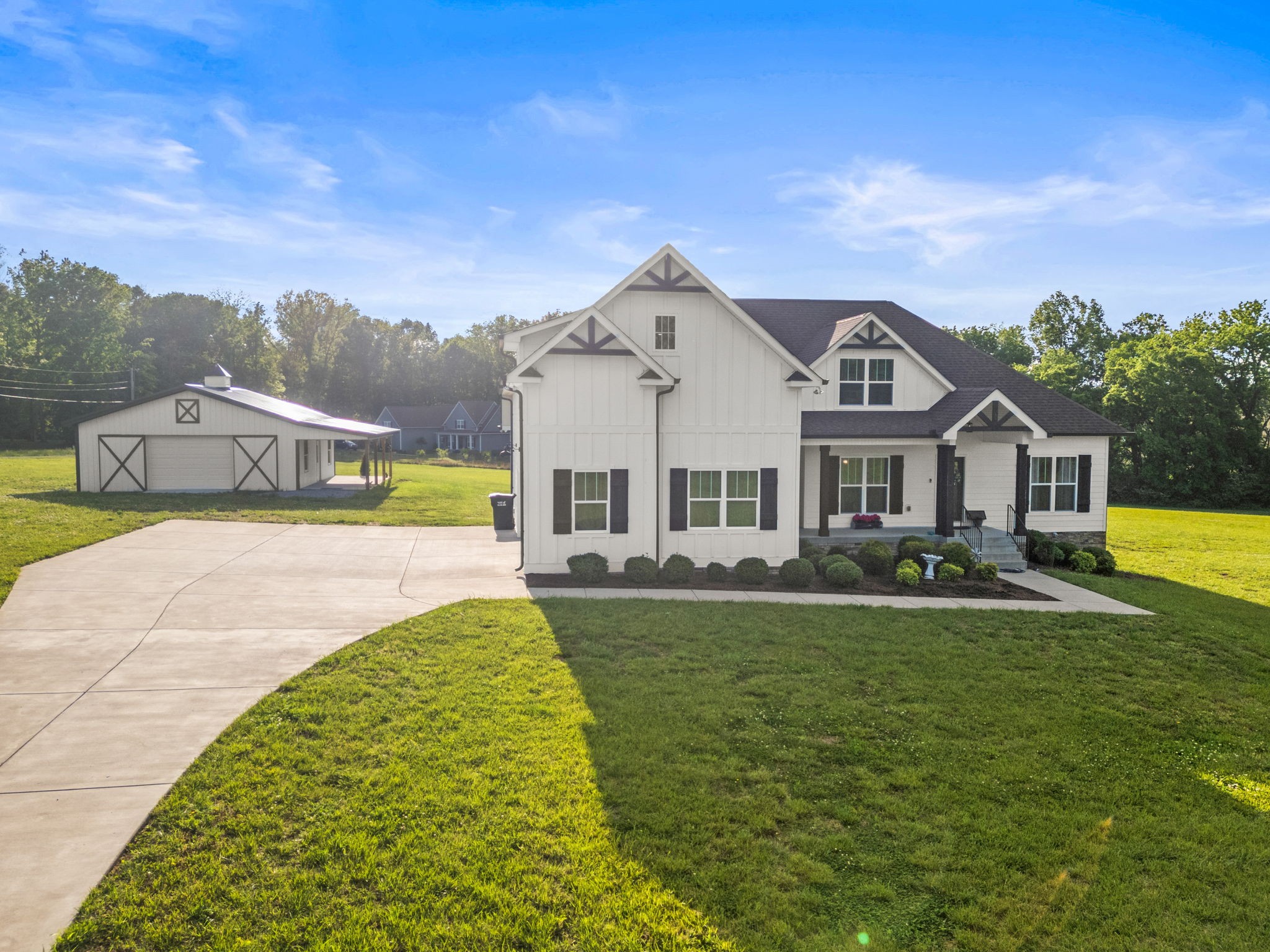 3378 New Hall Road Greenbrier, TN 37073 - Photo 82 of 83 a front view of a house with garden