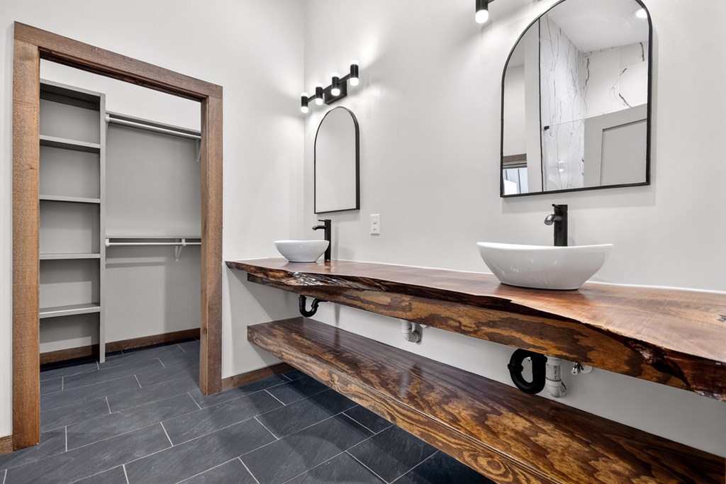 2461 Salem Road Mineral Bluff, GA 30559 - Photo 13 of 86 a bathroom with a double vanity sink and a mirror
