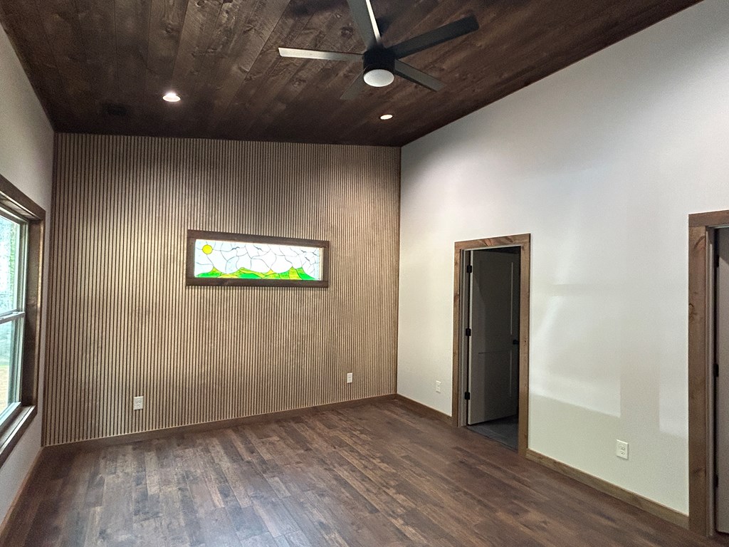 2461 Salem Road Mineral Bluff, GA 30559 - Photo 22 of 86 an empty room with wooden floor and windows