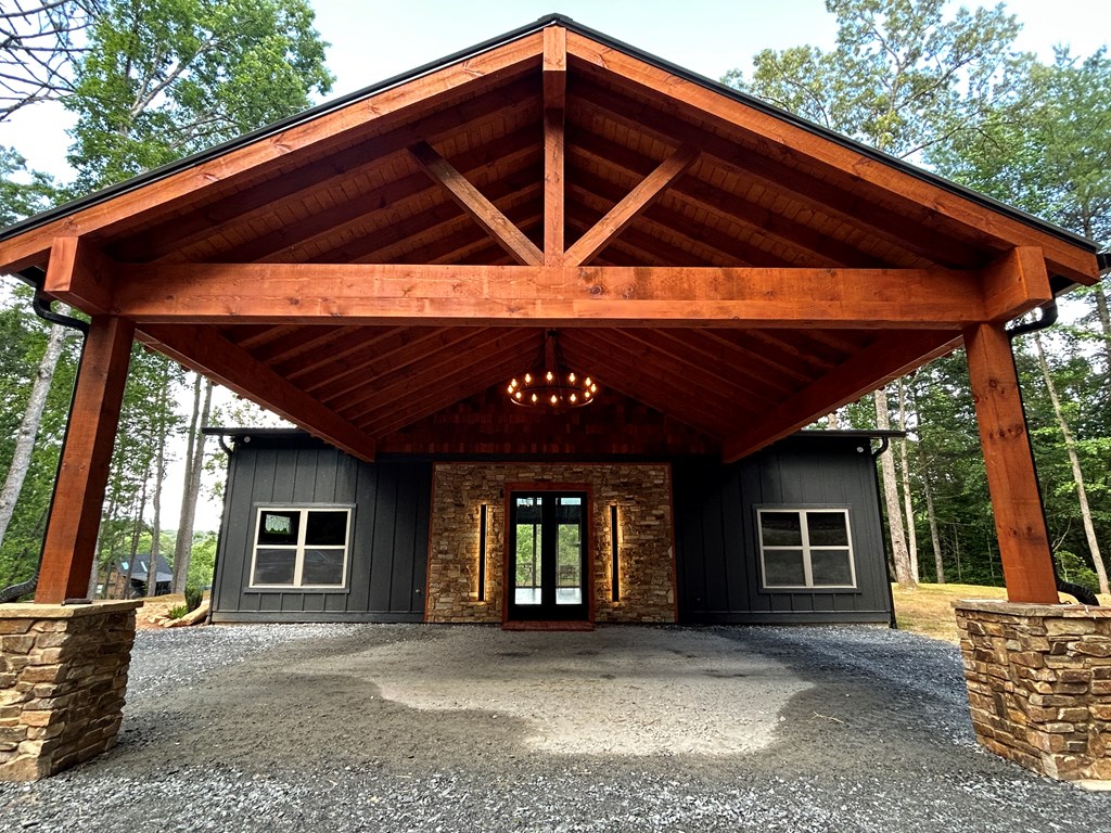 2461 Salem Road Mineral Bluff, GA 30559 - Photo 36 of 86 a front view of a house with garden