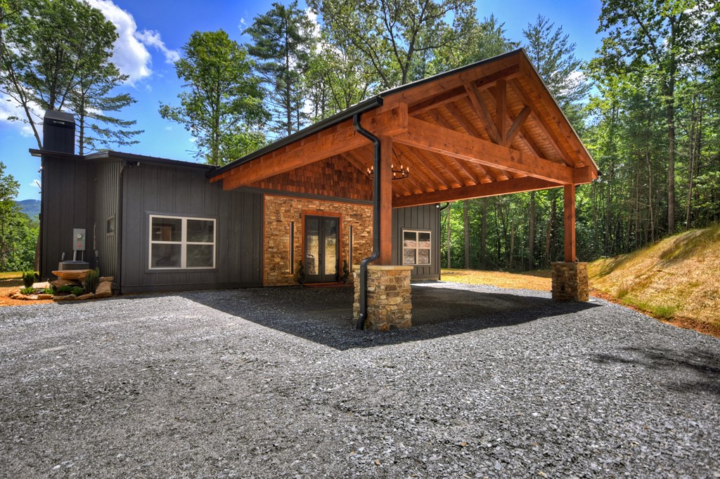2461 Salem Road Mineral Bluff, GA 30559 - Photo 47 of 86 a view of a house with backyard and porch