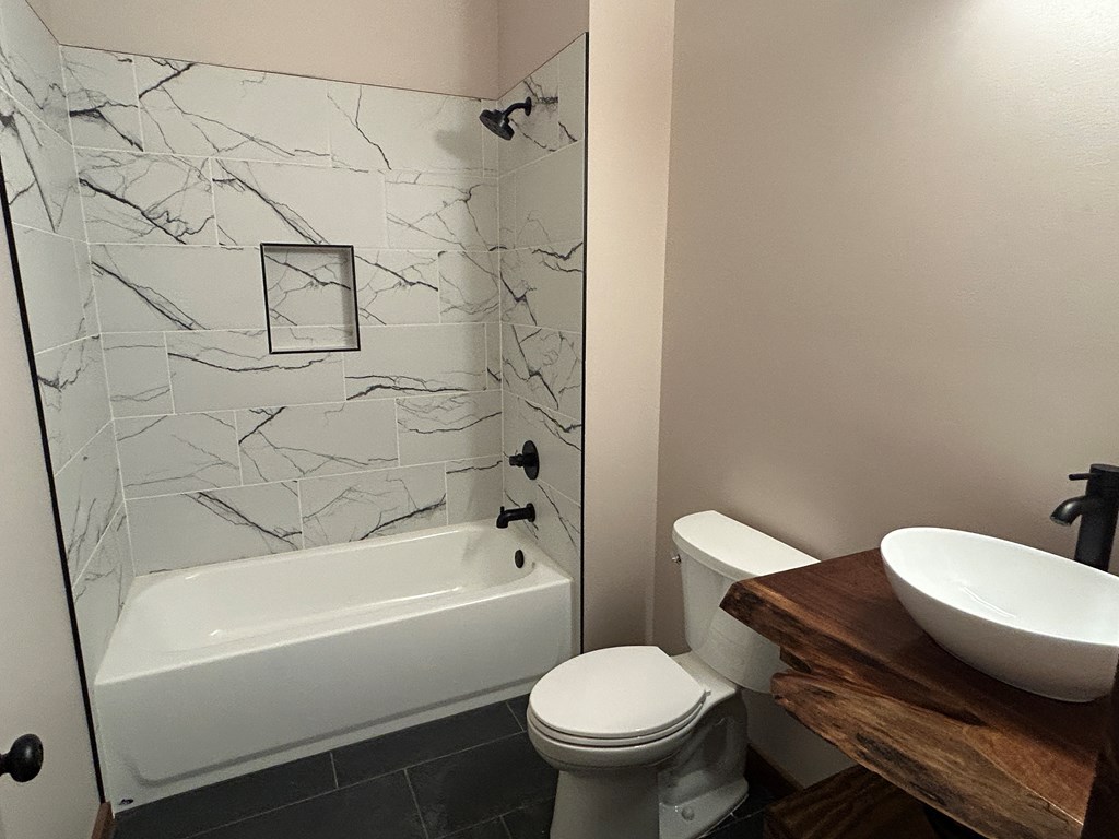 2461 Salem Road Mineral Bluff, GA 30559 - Photo 59 of 86 a bathroom with a toilet and a bathtub