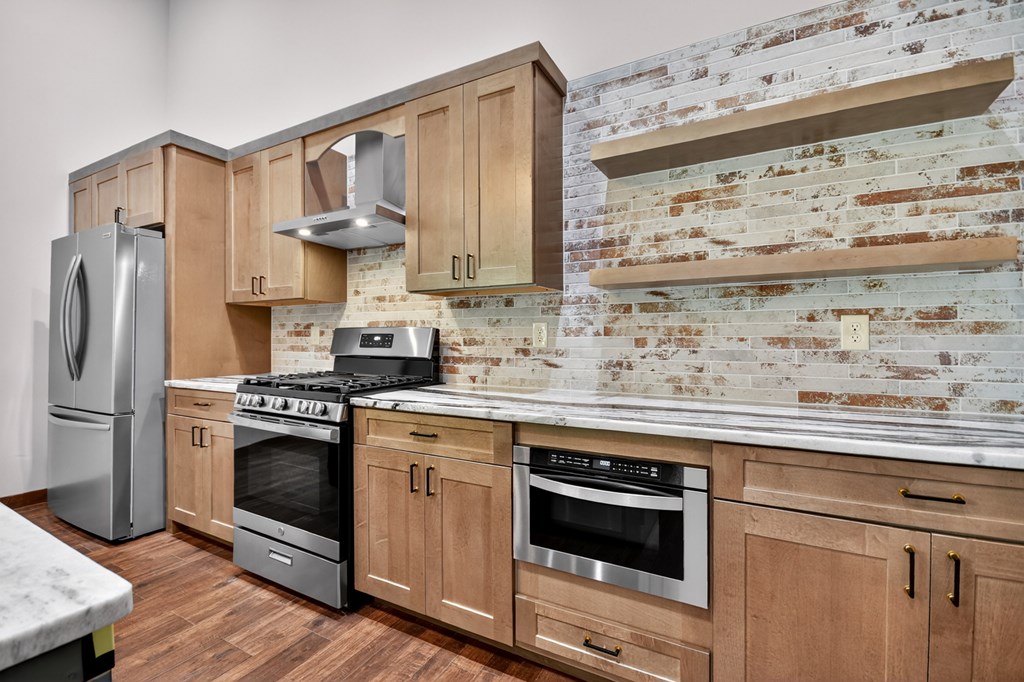 2461 Salem Road Mineral Bluff, GA 30559 - Photo 7 of 86 a kitchen with stainless steel appliances a stove and a refrigerator
