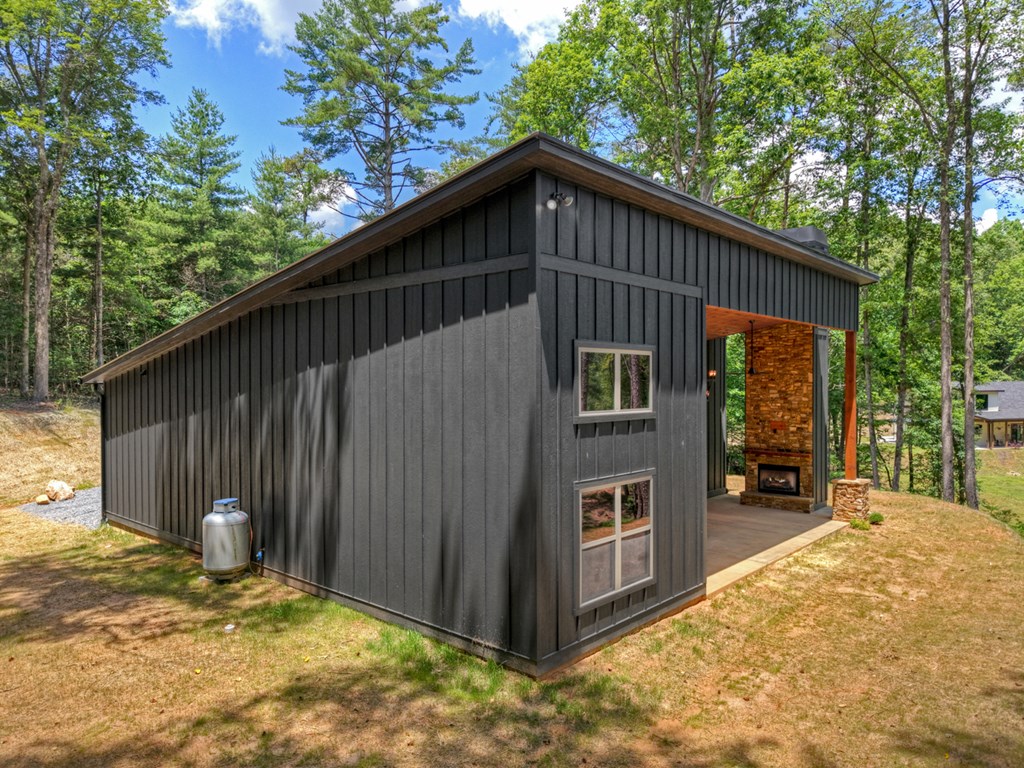 2461 Salem Road Mineral Bluff, GA 30559 - Photo 85 of 86 a backyard of a house with shaded area