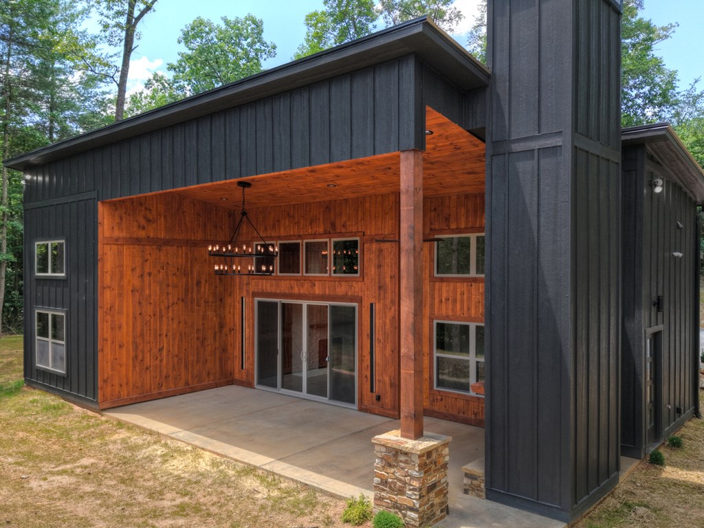 2461 Salem Road Mineral Bluff, GA 30559 - Photo 10 of 86 a backyard of a house with seating space