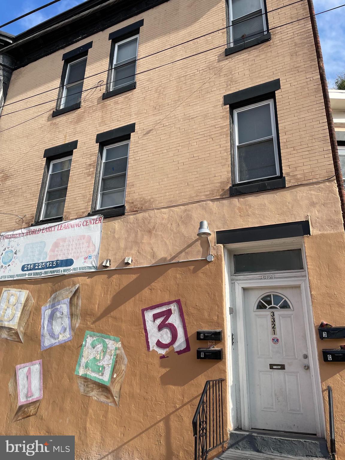 a front view of a house with parking