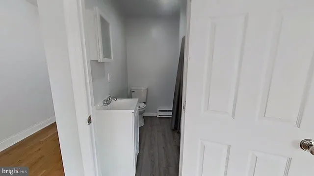 a bathroom with a sink and toilet