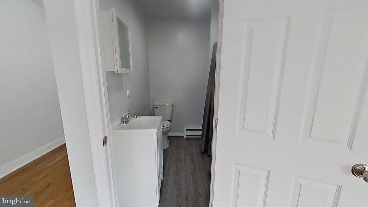 1234-40 Rising Sun Avenue, Unit C Philadelphia, PA 19140 - Photo 9 of 10 a bathroom with a sink and toilet