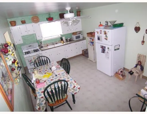 a bedroom with furniture and a bed