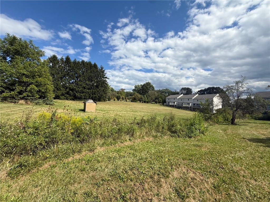 102 Baker Rd Extension Monaca, PA 15061 - Photo 7 of 12 a view of a lake with houses in the back