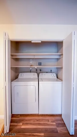 a utility room with washer and dryer