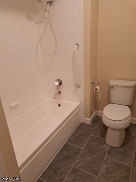 22 Sam Bonnell Drive, Unit 22 Clinton, NJ 08809 - Photo 16 of 16 a bathroom with a toilet and a bathtub