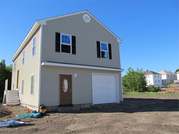 35 Manchester Street Fall River, MA 02721 - Photo 1 of 4 a front view of a house with a yard