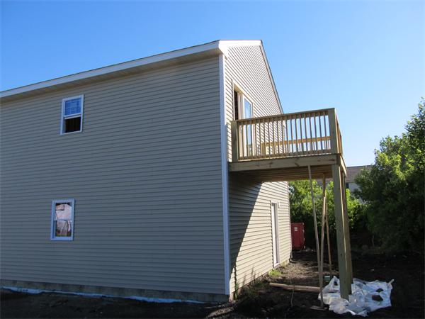 35 Manchester Street Fall River, MA 02721 - Photo 4 of 4 a view of a balcony with a dining space