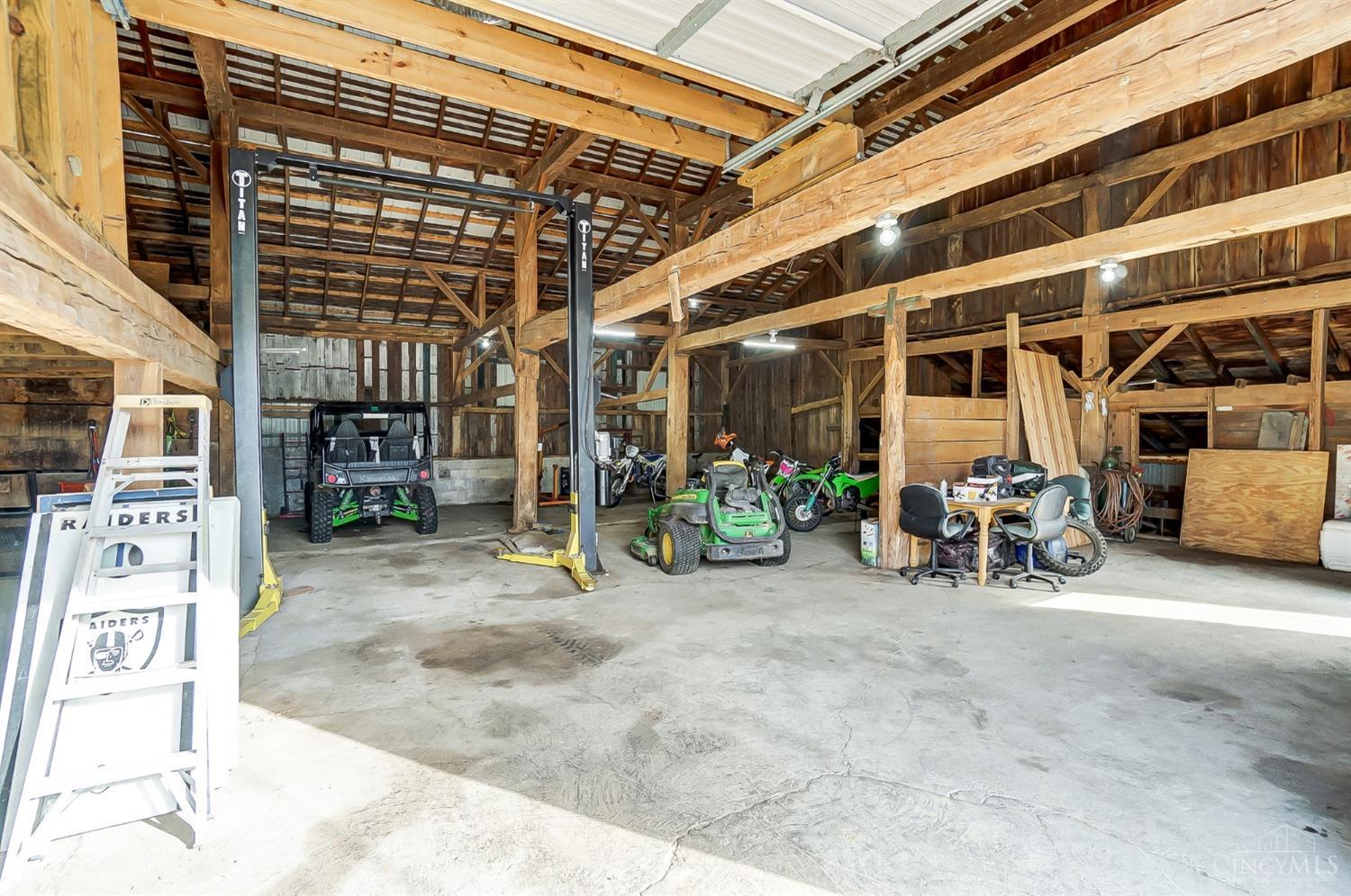 2711 Lebanon Road Clarksville, OH 45113 - Photo 37 of 48 An interior look of barn. The car lift in this picture is included in the sale of the home.