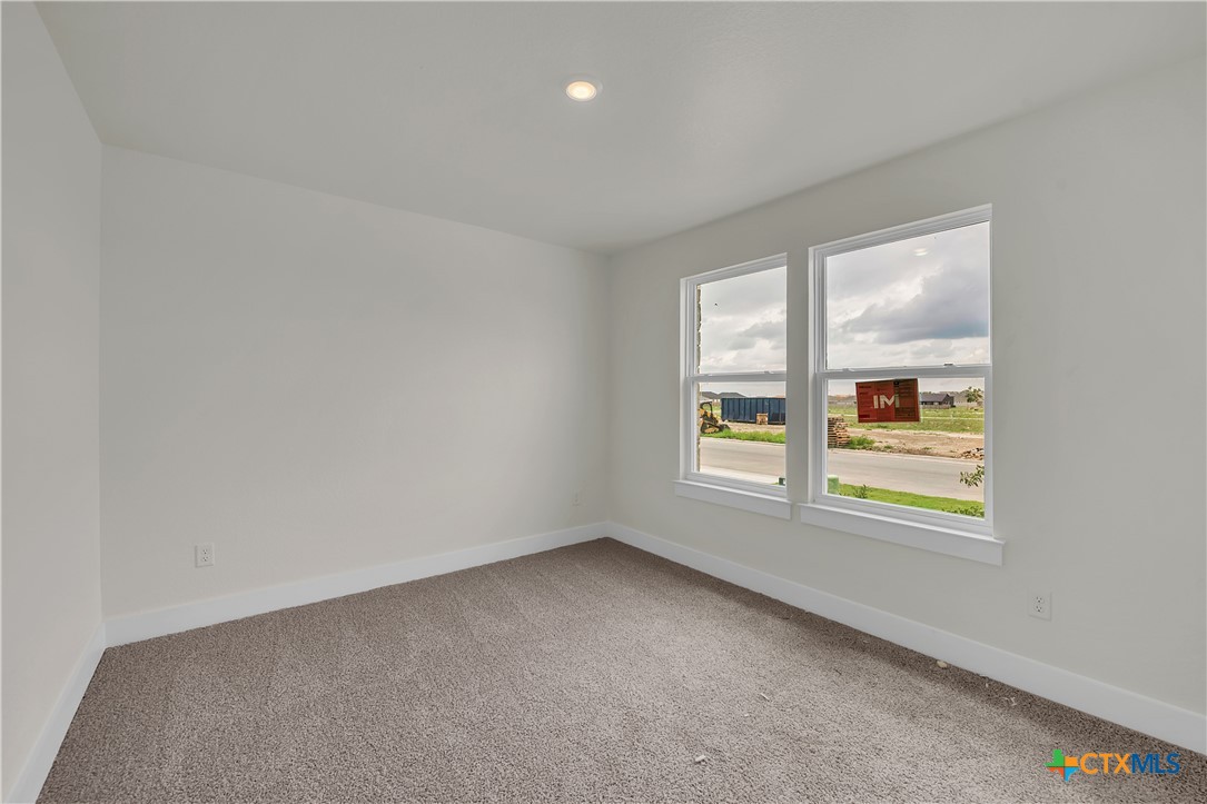 8905 Ponderosa Pine Road Temple, TX 76502 - Photo 8 of 16 an empty room with windows