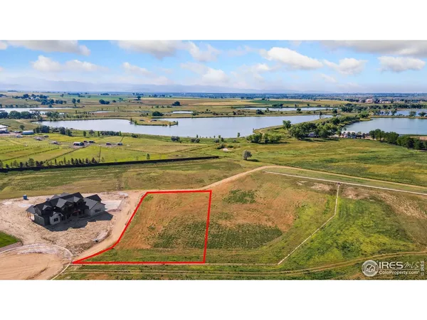 a view of an ocean and city