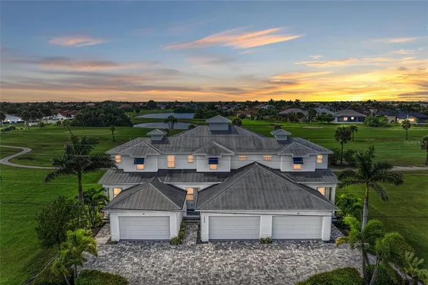 an aerial view of a house with a garden