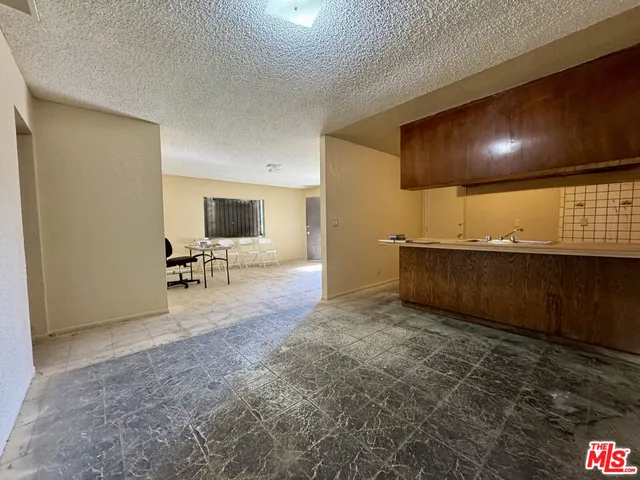 a view of a livingroom with furniture