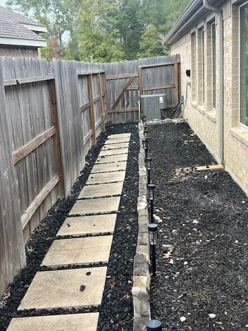 a view of a swimming pool with a bench