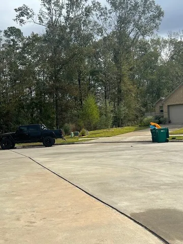 a view of swimming pool and trees
