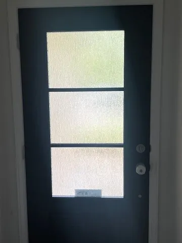 a table that has a fireplace and a dining table in it