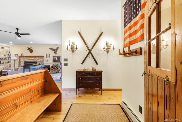 a view of a living room and window in a room