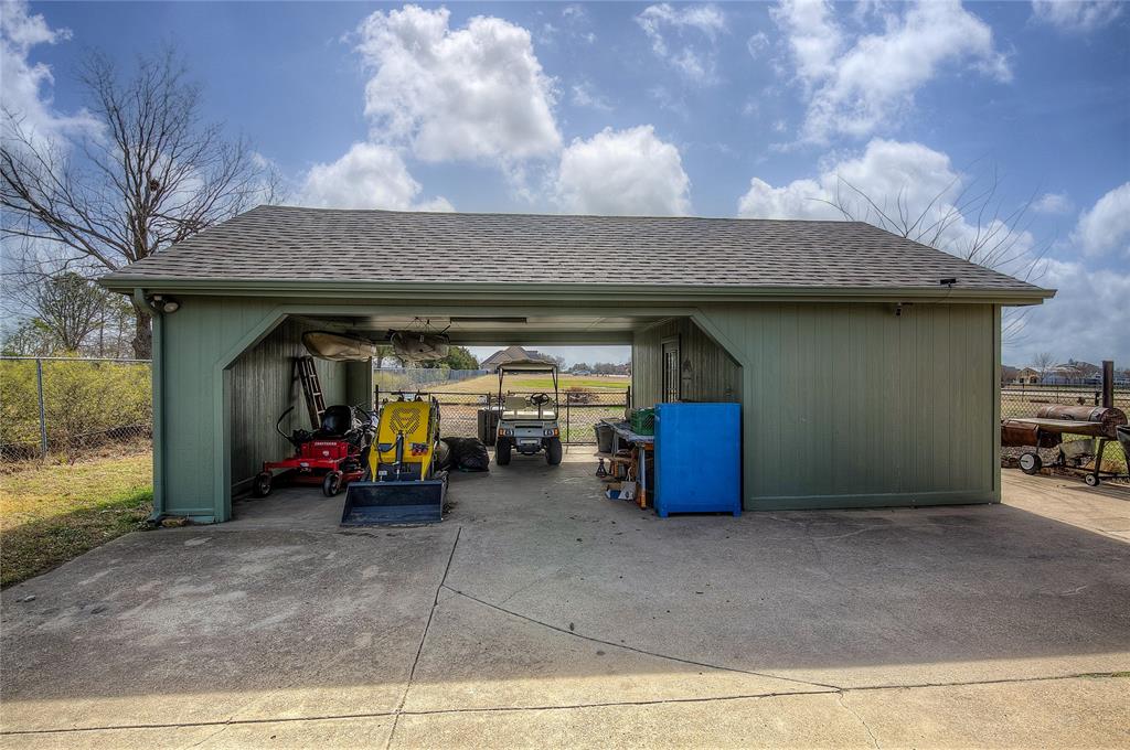 11326 Helms Trail Forney, TX 75126 - Photo 32 of 39 Additional Covered Parking and Storage
