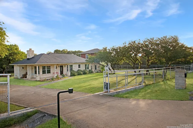 a view of a house with a big yard
