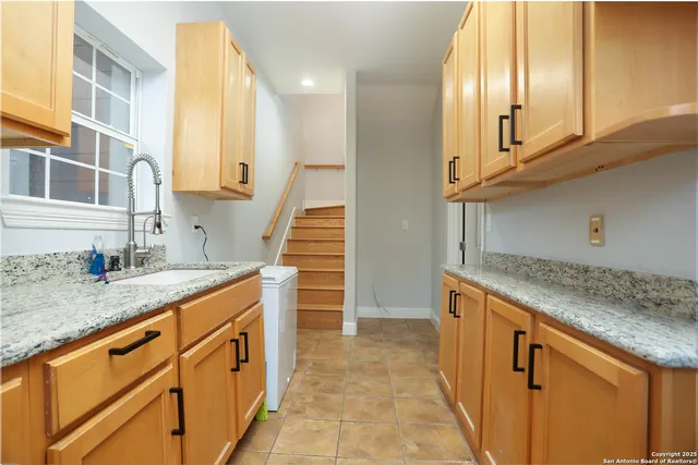 a view of a chairs and tables in patio