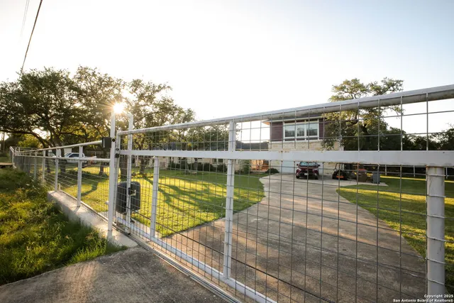 a view of a swimming pool with a lounge chairs