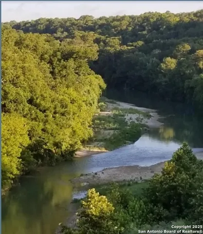 an aerial view of residential house with outdoor space