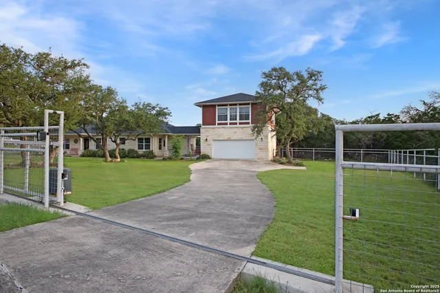 a view of a house with a big yard